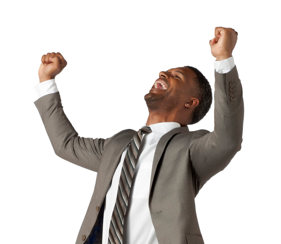 Portrait of happy black businessman against white background
