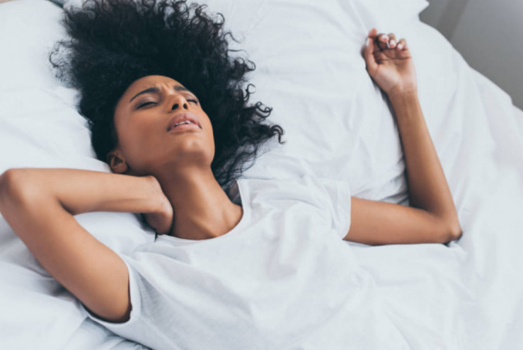 Woman having morning neck pain