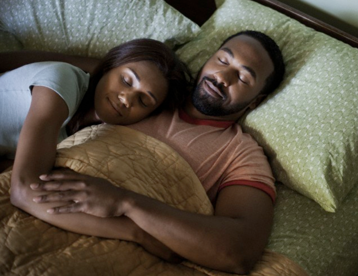 black couple sleeping.