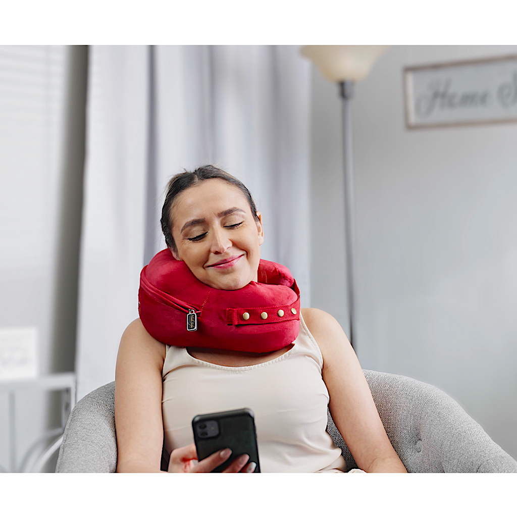 person texting while wearing comfortable neck supporting pillows for sleeping travel spine support - burgundy